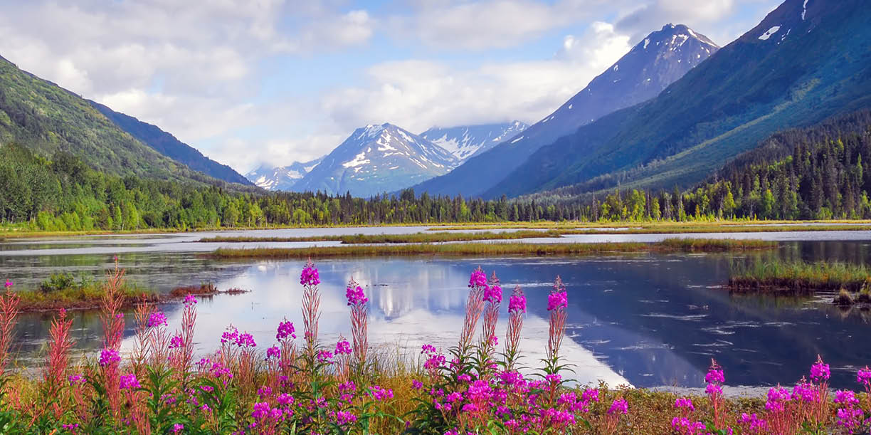 Alaskan mountain and lake landscape. Tern Lake on the Kenai peninsula with mountain reflection in lake